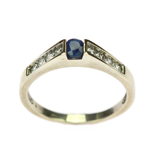 Gold ring with sapphire and...