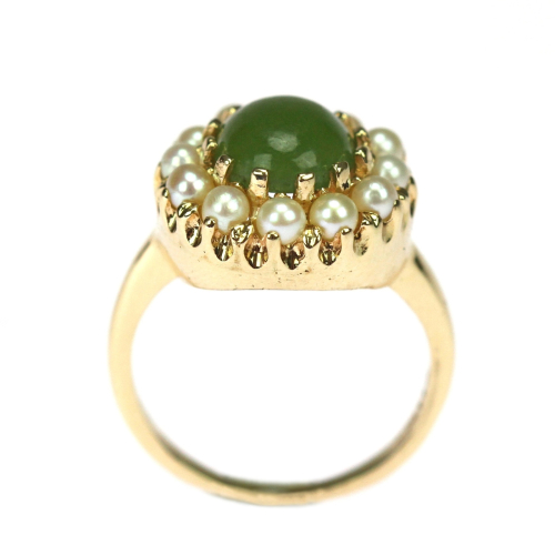 Gold ring with jade and...