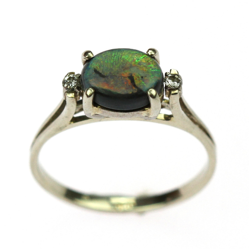 Gold ring with opal and...