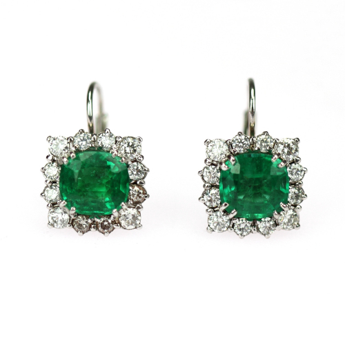 Gold earrings with emeralds...