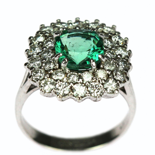 Gold ring with emerald and...