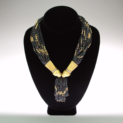 Black pearl and gold necklace