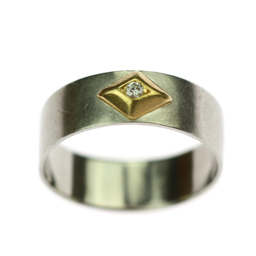 Platinum ring with a diamond