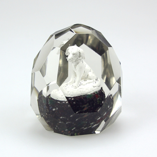 Glass paperweight with a dog