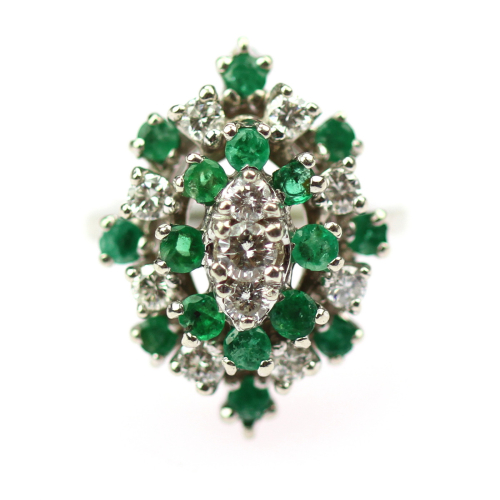 Gold ring with emeralds and...