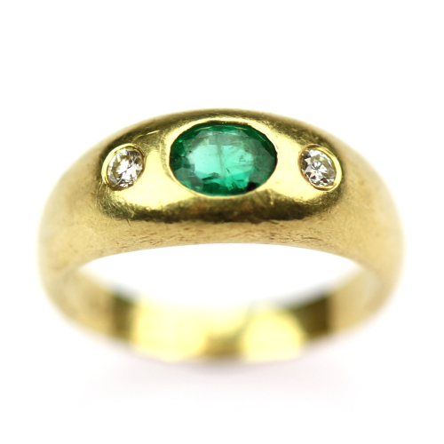 Gold ring with emerald and...