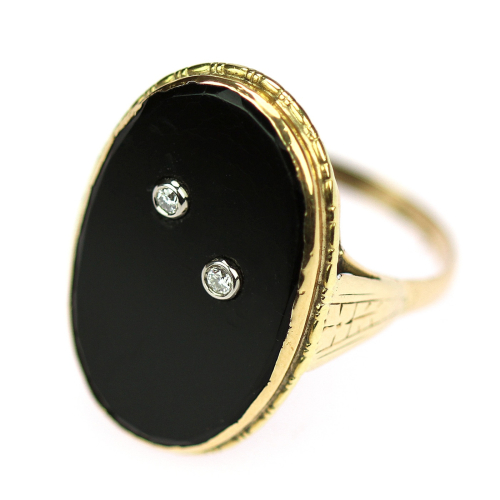 Gold ring with onyx and...