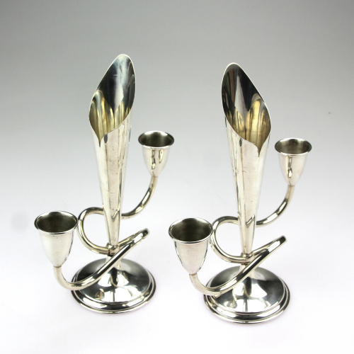 Pair of candelabras with vase
