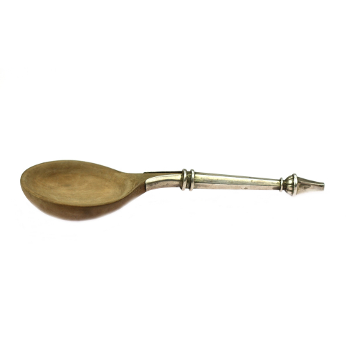 Wooden spoon with silver handle