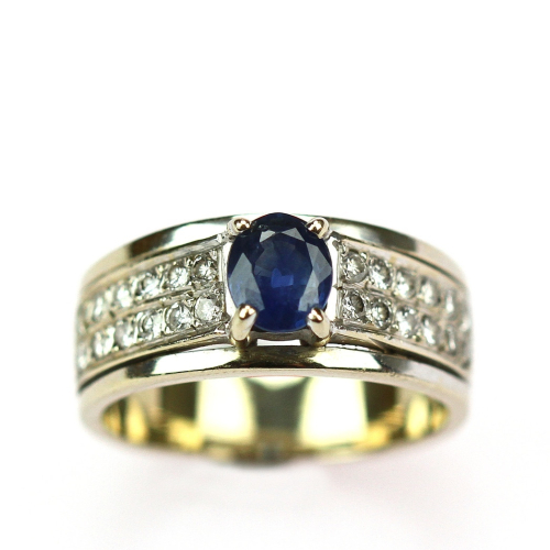 Gold ring with sapphire and...