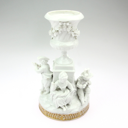 Porcelánový figurální svícen