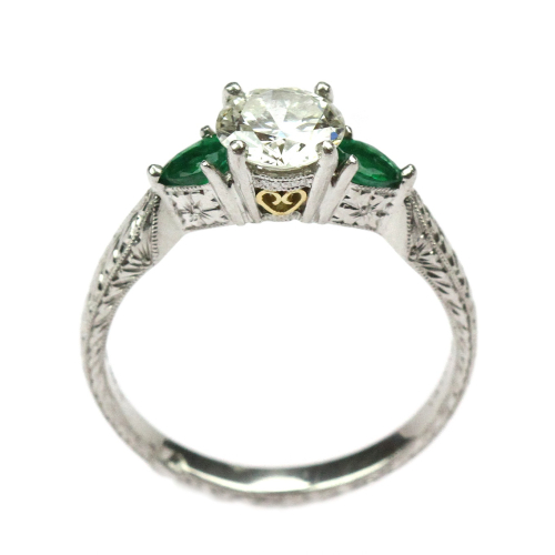 Engraved diamond and emerald ring