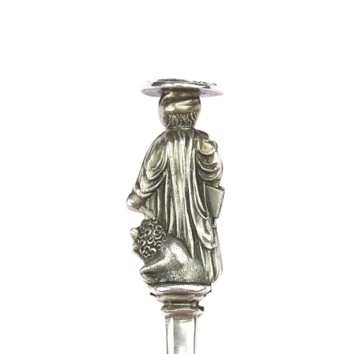 Silver spoons with evangelist motif