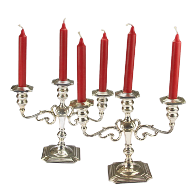 A pair of three-branched silver candelabra