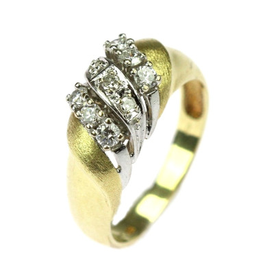 Yellow and white gold ring with diamonds