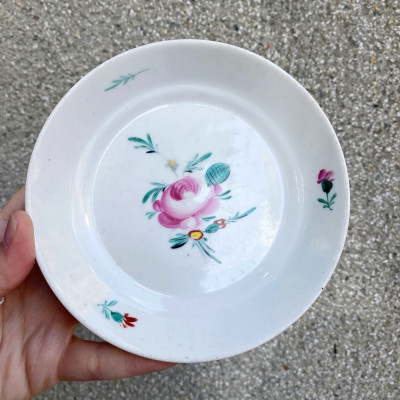 Porcelain cup with saucer