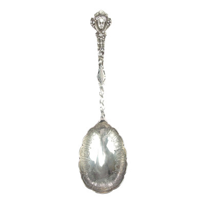 Decorated silver ladle