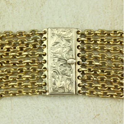 Zlatý náramek z devíti řetízků