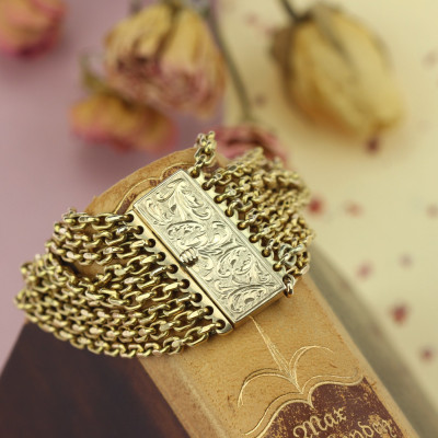 Zlatý náramek z devíti řetízků