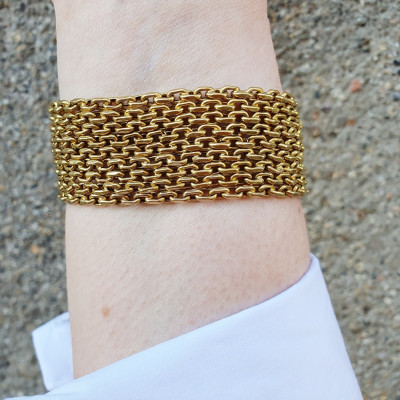 Zlatý náramek z devíti řetízků