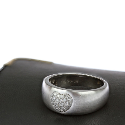 Gold ring with diamond heart