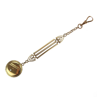 Gold chatelaine with medallion