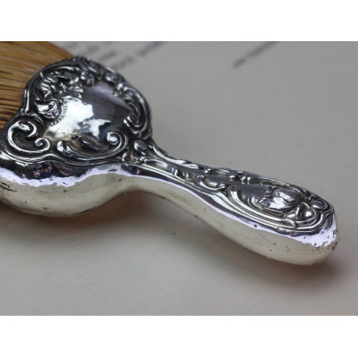 Hand broom with silver handle