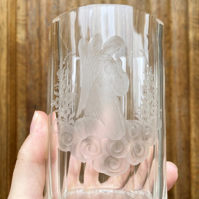 Beaker with carving of an angel