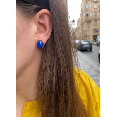 Earrings with lapis lazuli in a gold frame