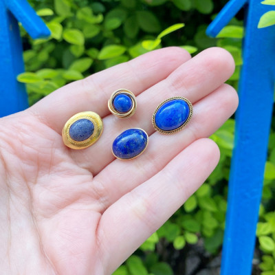 Earrings with lapis lazuli in a gold frame