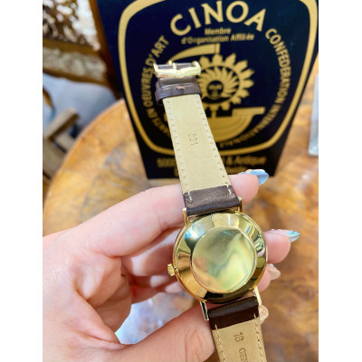 Zlaté náramkové hodinky - Tiffany & Co.