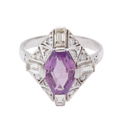 Gold ring with violet sapphire and diamonds