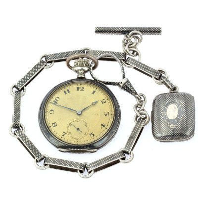 Silver pocket watch and chain with locket