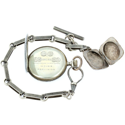Silver pocket watch and chain with locket