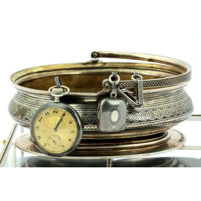 Silver pocket watch and chain with locket