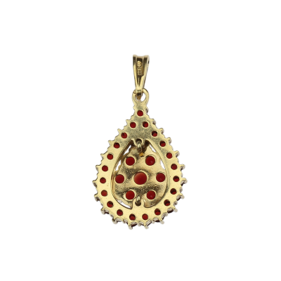 Gold pendant with garnets