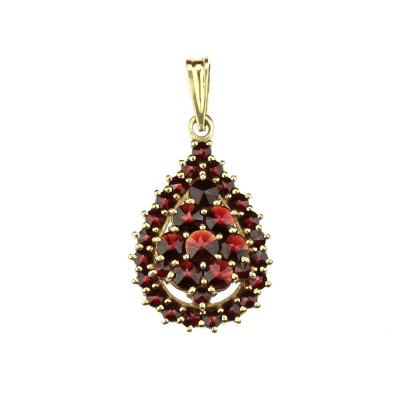 Gold pendant with garnets