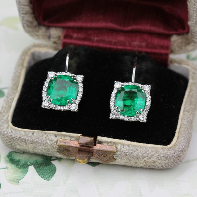 Gold earrings with emeralds and diamonds