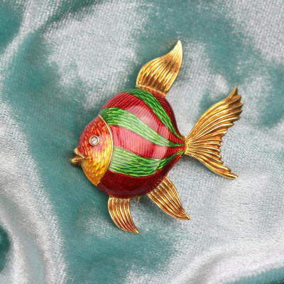 Gold brooch with enamel – fish