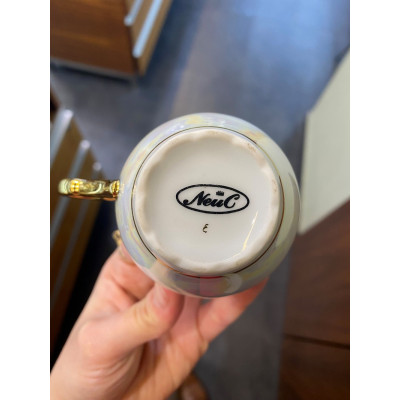 Porcelánový šálek s podšálkem