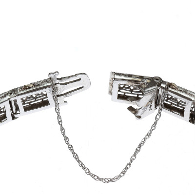 Zlatý náramek s diamanty a imitací smaragdů