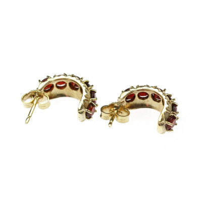 Gold earrings with garnets