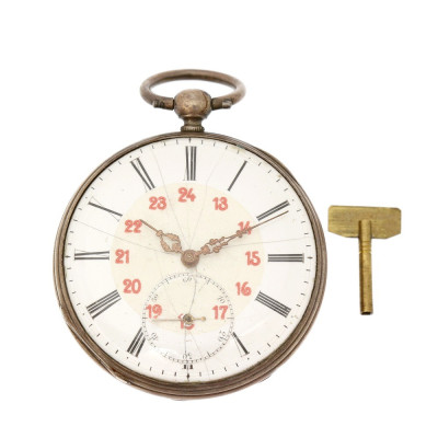 Silver pocket watch with a key