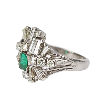 Silver ring with diamonds and emerald