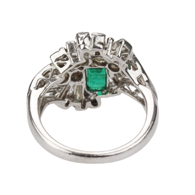 Silver ring with diamonds and emerald