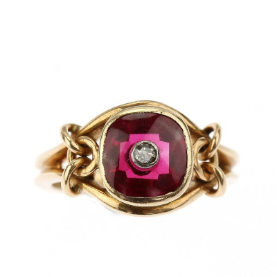 Gold ring with a synthetic ruby and a diamond