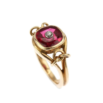 Gold ring with a synthetic ruby and a diamond