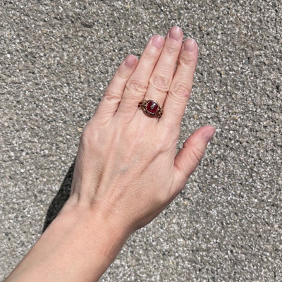 Gold ring with a synthetic ruby and a diamond