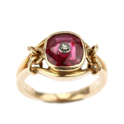 Gold ring with a synthetic ruby and a diamond