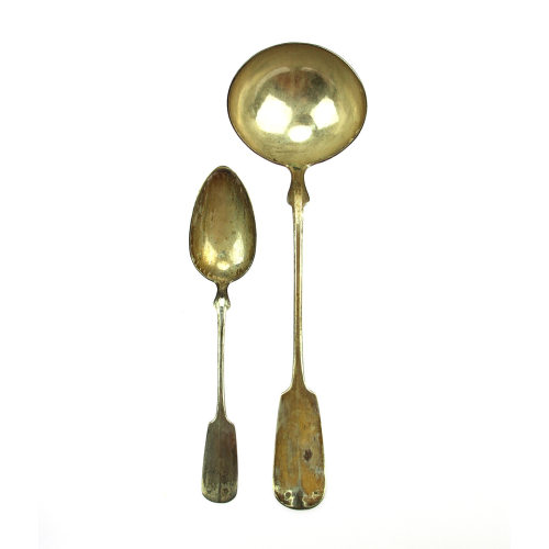 Set of silver spoons and ladle
